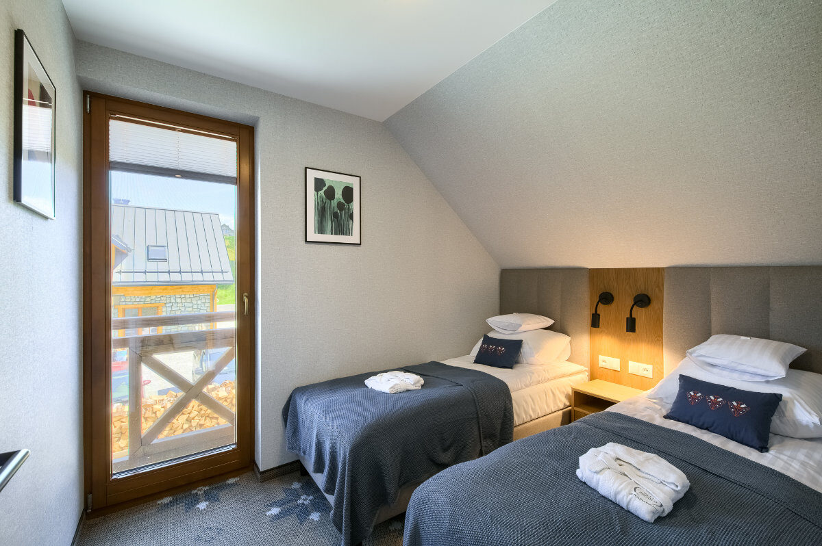 Apartament w Kamiennym Domku - sypialnia